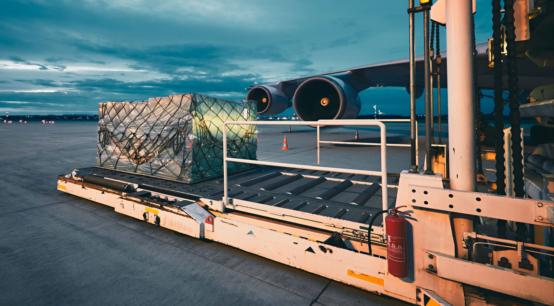 Cargo plane being loaded up on runway